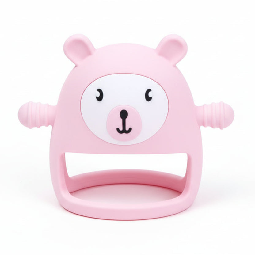 Pink bear-shaped teether on a white background