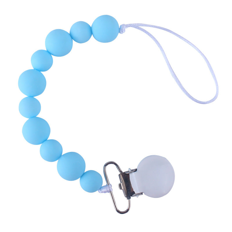 Blue silicone pacifier clip on a white background
