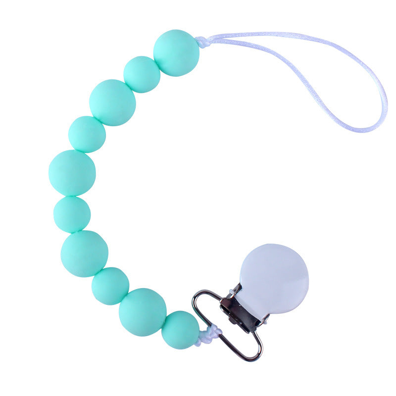 Teal pacifier clip with a clip on a white background