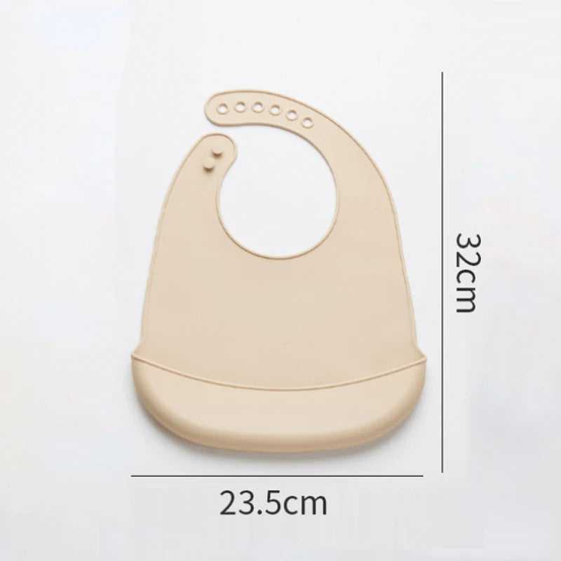 Beige baby bib with dimensions on a white background
