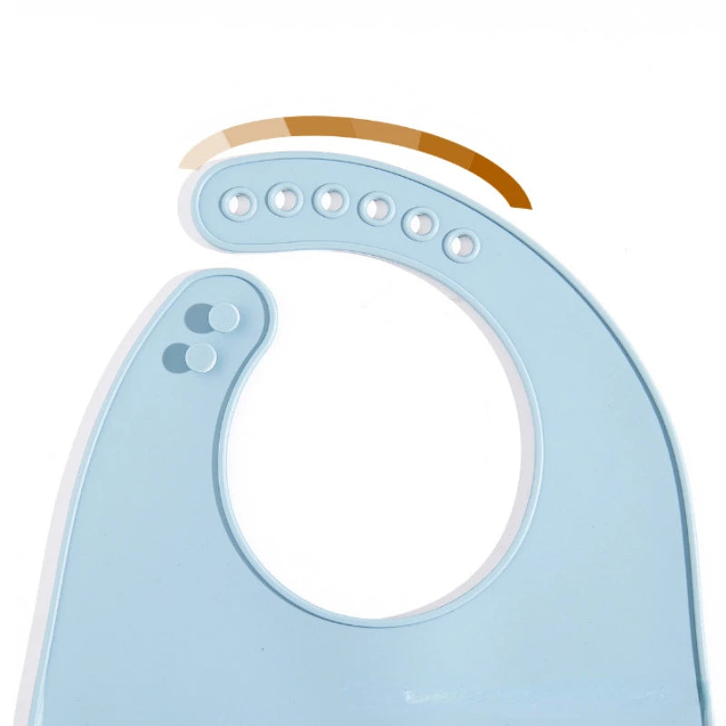 Light blue baby bib with brown strap on a white background