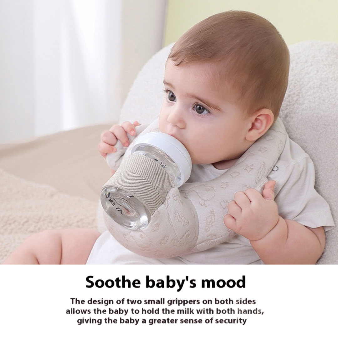 Baby holding a bottle with text about soothing baby's mood